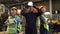 Group of asian factory man and women workers wearing the helmet safety and standing with confidence and smiling. In background