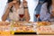 Group of Asian female friends at a party Have a fun time together. pizza party wine drinks