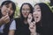 Group of asian teenager relaxing and eating snack food