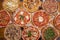 Group of assorted pizzas with pepperoni, seafood, eggs and green asparagus, margarita, arugula, bacon, mushrooms, anchovies on