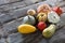 Group of autumn colorful organic vegetables over genuine old wood