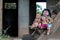 Group of baby dolls sitting on old wooden stairs