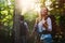 Group of backpacking hikers going for forest trekking