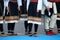 Group of Balkans folk dancers in an outdoor festival.