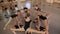 A group of ballerinas rehearsing in a ballet studio. Flexible ballerinas dance.