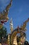 Group of beautiful statues of Buddha images, angels and Nagas at Wat Don Khanak Temple.