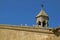 Group of Beautiful White Doves Relaxing on the Roof of Armenian Orthodox Church