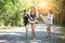 Group of beautiful young women walking in the forest, enjoying vacation,