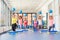 Group of beautiful young women working out on blue stepper.