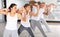 Group of beginners mastering martial arts for self defence in gym