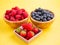 Group berry mix - strawberries, raspberries and blueberries of nature fruit in wood bowl, healthy food for diet