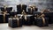 A group of black boxes with gold ribbons