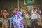 A group of black children performs African folk music and dance