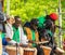 Group of black musicians at a concert with drums at a festival for the first of May, Labour Day