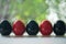 Group of black and red of egg shape ceramic shakers for salt and pepper