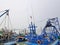 Group of Blue Fisherman Boats Dock at the Pier