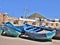 Group of blue fishing boats on the shore at the pier in the city of Morocco
