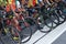 A group of boys dressed in cycling sports along with their bikes