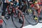 A group of boys dressed in cycling sports along with their bikes