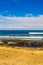 Group of boys and girls at sunrise entering the Ocean to start a surfing class at Playa de Las Americas. April 11, 2019. Santa