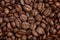 Group of brown coffee grains background, macro, close-up