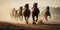 Group of brown thoroughbred racing horses gallop along dusty ground