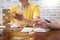 Group of business creative people building tower by wooden block