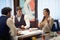 A group of business partners chatting at a lunch at the restaurant. Business, restaurant, lunch