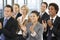 Group Of Business People Applauding Speaker At The End Of A Pres