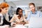 Group of business people sitting at desk