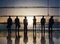 Group of Business People Standing at Boardroom