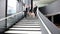 Group of business people walking at stairs