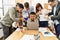 Group of business workers screaming to stressed partner at the office