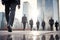 Group of businessmen are walking. Blurred city building background . AI generated