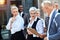 Group of businessmen walking down the street