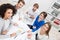 Group of businesspeople seated around a table