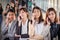 Group of businesswomen making a phone call