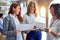 Group of businesswomen smiling happy working together