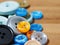 group of button studs on wooden background