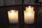 Group of candles on dark background in a church