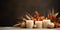 A group of candles sitting on top of a wooden table. Autumn, Thanksgiving decor. Digital image.