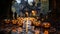 A group of carved pumpkins on a wet road with lights in halloween night