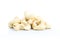 Group cashew nuts heap on white