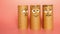group of characters made from toilet paper rolls with painted faces expressing happiness or satisfaction over pink
