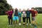 Group of cheerful diverse friends in the park