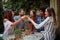 Group of cheerful friends making a toast