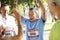 Group of cheerful senior runners at the park