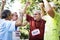 Group of cheerful senior runners at the park