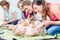 Group of cheerful women learning to take care of their babies