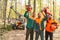 Group of cheering forest workers as lumberjack